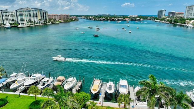 875 E Camino Real Unit 2G, Boca Raton, FL 33432 - water view with boat lift, nearby urban area, and a dock
