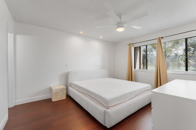 4489 Luxemburg Ct Unit 306, Lake Worth, FL 33467 - bedroom with wood finished floors, baseboards, recessed lighting, and a ceiling fan