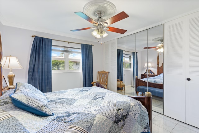 2822 Crosley Dr W Unit D, West Palm Beach, FL 33415 - bedroom featuring crown molding, a closet, a ceiling fan, and light tile patterned floors