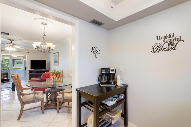 2822 Crosley Dr W Unit D, West Palm Beach, FL 33415 - dining room with a chandelier, a ceiling fan, light tile patterned floors, and ornamental molding