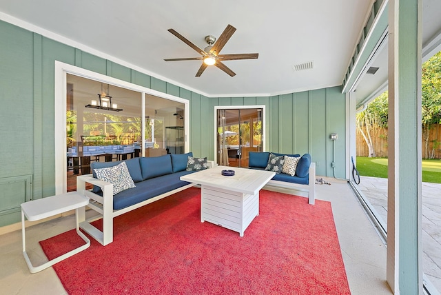 2590 Monaco Ter, Palm Beach Gardens, FL 33410 - view of patio featuring an outdoor living space and a ceiling fan