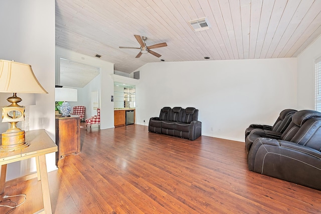 2590 Monaco Ter, Palm Beach Gardens, FL 33410 - living room featuring vaulted ceiling, wood ceiling, a ceiling fan, wood finished floors, and healthy amount of natural light