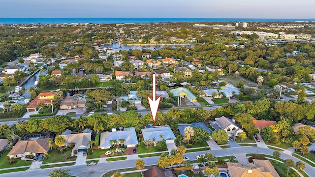 2590 Monaco Ter, Palm Beach Gardens, FL 33410 - aerial view of property's location with nearby suburban area and a large body of water