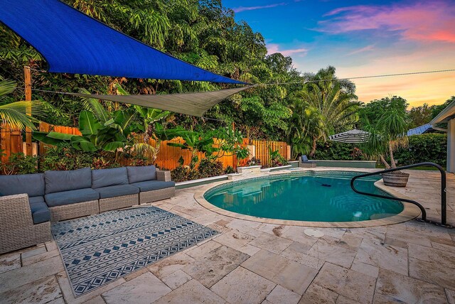 2590 Monaco Ter, Palm Beach Gardens, FL 33410 - view of pool with a patio area, outdoor lounge area, a fenced backyard, and a jacuzzi