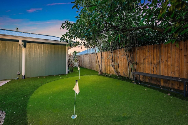 2590 Monaco Ter, Palm Beach Gardens, FL 33410 - view of yard with an area to practice putting