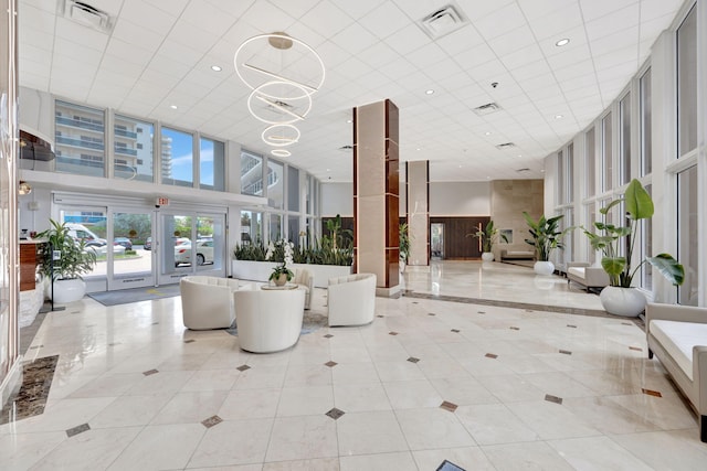 4100 Galt Ocean Dr Unit 311, Fort Lauderdale, FL 33308 - lobby featuring a towering ceiling and recessed lighting