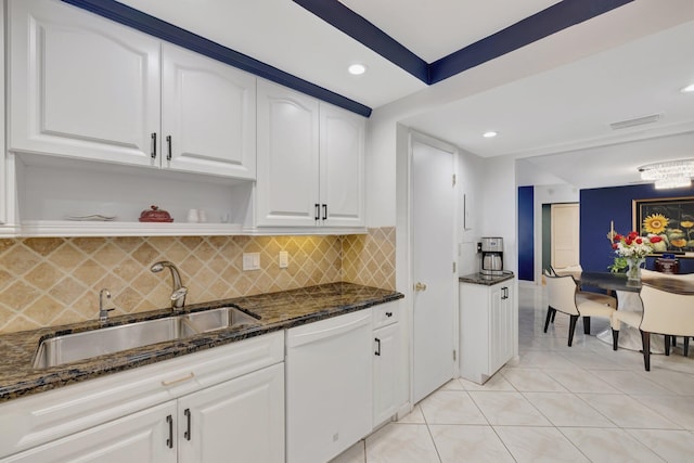 4100 Galt Ocean Dr Unit 311, Fort Lauderdale, FL 33308 - kitchen featuring dishwasher, dark stone countertops, a sink, decorative backsplash, and recessed lighting
