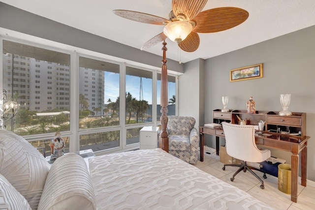 4100 Galt Ocean Dr Unit 311, Fort Lauderdale, FL 33308 - bedroom with a desk, light tile patterned floors, and a ceiling fan