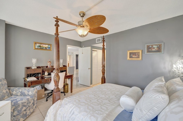 4100 Galt Ocean Dr Unit 311, Fort Lauderdale, FL 33308 - bedroom with light tile patterned flooring, a closet, a desk, and a ceiling fan