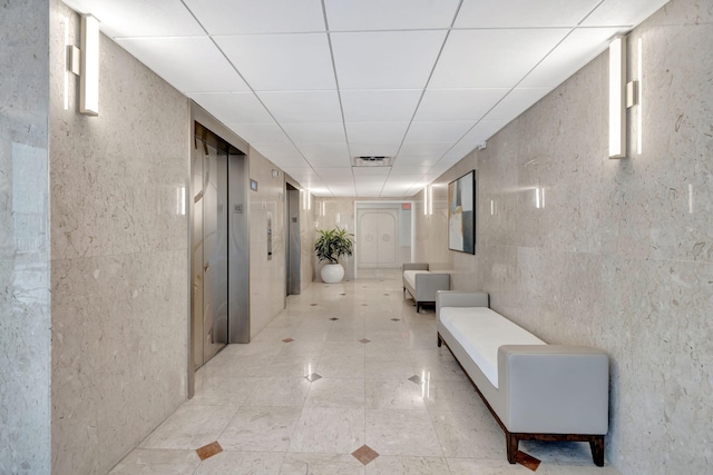 4100 Galt Ocean Dr Unit 311, Fort Lauderdale, FL 33308 - hall featuring elevator and a paneled ceiling