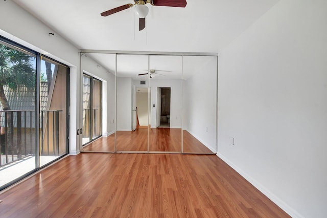 6604 66th Way, West Palm Beach, FL 33409 - empty room featuring a ceiling fan, wood finished floors, and baseboards