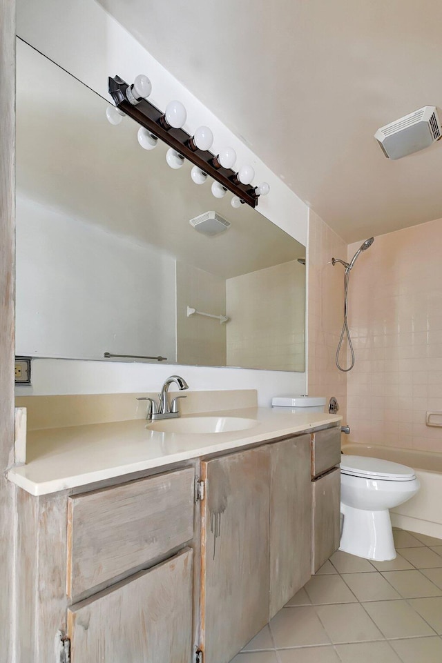 6604 66th Way, West Palm Beach, FL 33409 - bathroom with tile patterned floors, vanity, toilet, and shower / bath combination