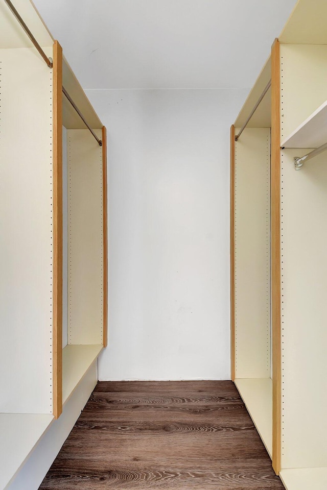 6604 66th Way, West Palm Beach, FL 33409 - spacious closet featuring wood finished floors