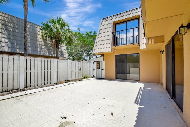 6604 66th Way, West Palm Beach, FL 33409 - fenced backyard with a patio area