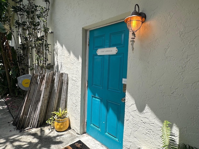 498 Oregon Ln, Boca Raton, FL 33487 - entrance to property featuring stucco siding