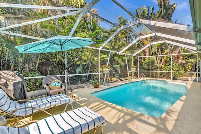 498 Oregon Ln, Boca Raton, FL 33487 - outdoor pool with a patio area and a lanai