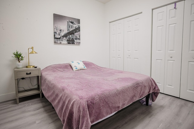 5405 NW 27th Ct, Margate, FL 33063 - bedroom featuring wood finished floors and two closets