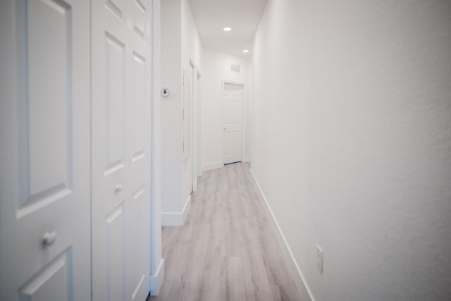 5405 NW 27th Ct, Margate, FL 33063 - corridor with light wood finished floors and baseboards