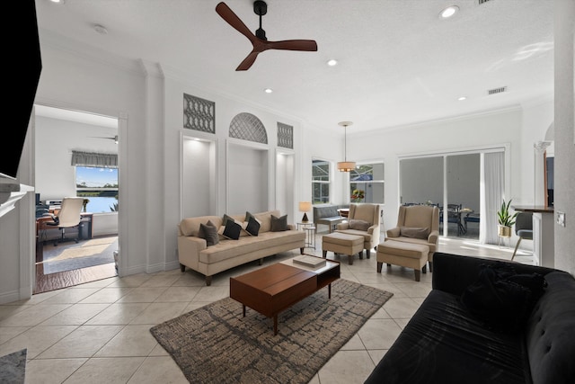 1936 SW Wood Duck Ln, Palm City, FL 34990 - living room with ceiling fan, crown molding, light tile patterned floors, and recessed lighting