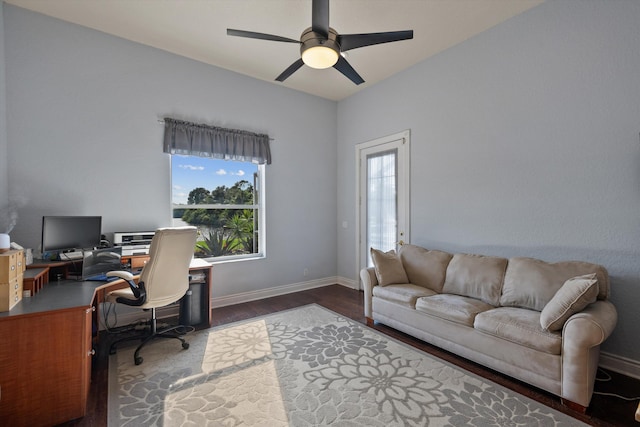1936 SW Wood Duck Ln, Palm City, FL 34990 - office area featuring dark wood-style flooring, a ceiling fan, and baseboards