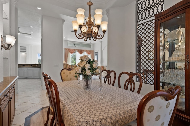 1936 SW Wood Duck Ln, Palm City, FL 34990 - dining space with a chandelier, light tile patterned floors, and recessed lighting