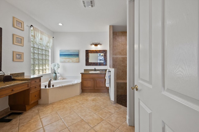 1936 SW Wood Duck Ln, Palm City, FL 34990 - bathroom featuring vanity, a bath, and tile patterned floors