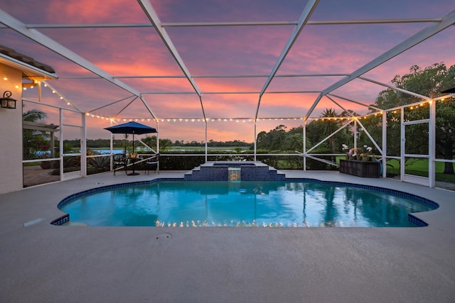 1936 SW Wood Duck Ln, Palm City, FL 34990 - view of pool with a patio, glass enclosure, and a pool with connected hot tub