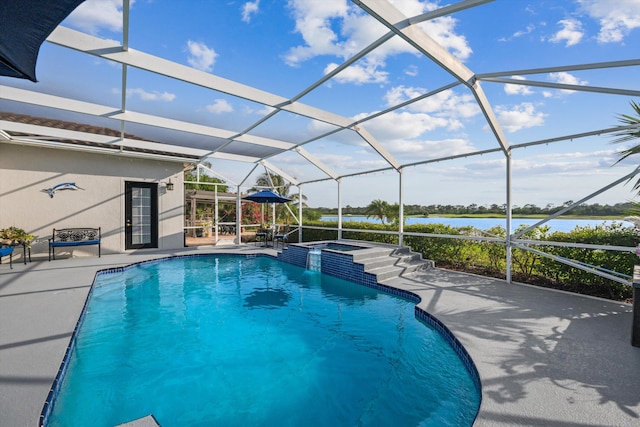 1936 SW Wood Duck Ln, Palm City, FL 34990 - view of swimming pool with a water view, a patio, a lanai, and a pool with connected hot tub