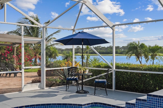 1936 SW Wood Duck Ln, Palm City, FL 34990 - swimming pool featuring a water view, a patio area, and a lanai