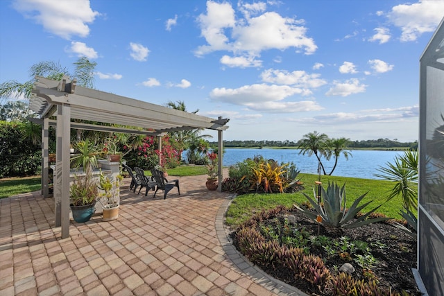 1936 SW Wood Duck Ln, Palm City, FL 34990 - view of patio / terrace with a pergola and a water view