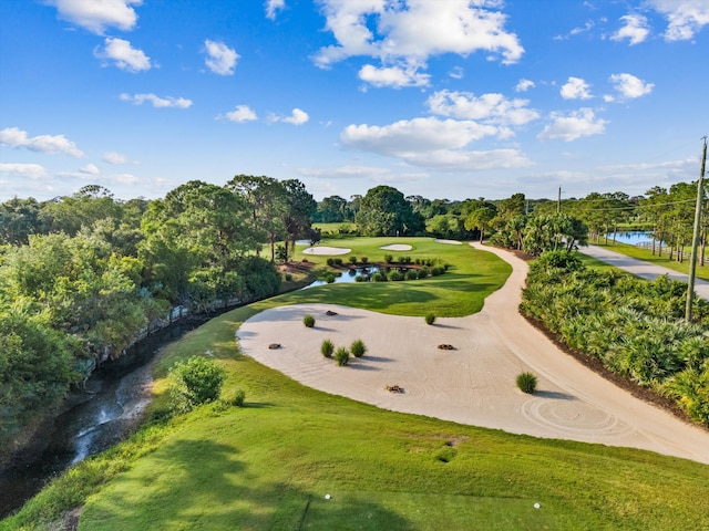 1936 SW Wood Duck Ln, Palm City, FL 34990 - aerial view of a tree filled landscape, a nearby body of water, and a golf course