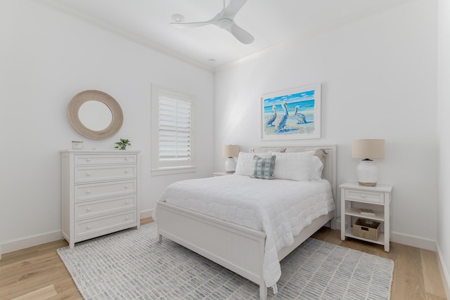 640 SE Boboli Way, Port Saint Lucie, FL 34984 - bedroom featuring ornamental molding, wood finished floors, baseboards, and a ceiling fan