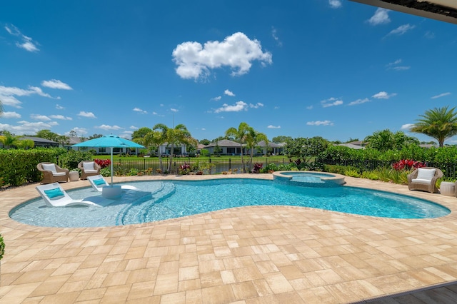640 SE Boboli Way, Port Saint Lucie, FL 34984 - view of pool featuring a patio area and a pool with connected hot tub