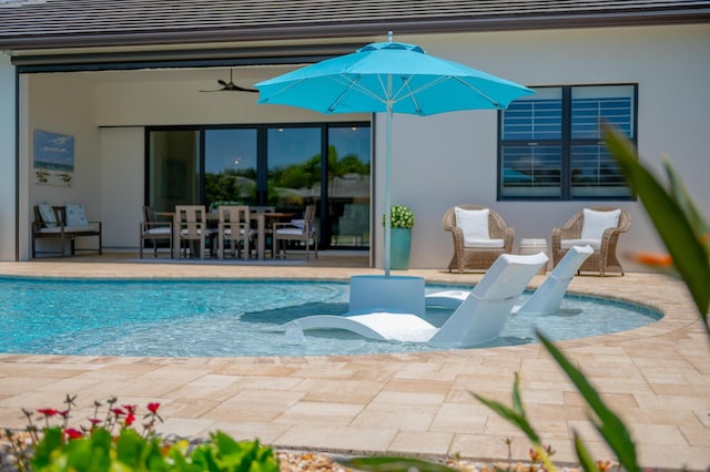 640 SE Boboli Way, Port Saint Lucie, FL 34984 - swimming pool with a patio, ceiling fan, and outdoor dining space