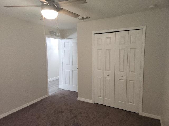 1721 SE Biddle Ln, Port Saint Lucie, FL 34983 - unfurnished bedroom with a closet, carpet flooring, baseboards, and a ceiling fan