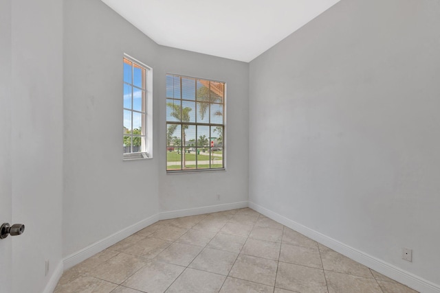 1897 SW Citation Ave, Port Saint Lucie, FL 34953 - empty room featuring baseboards and light tile patterned floors