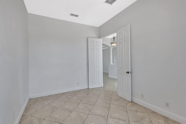 1897 SW Citation Ave, Port Saint Lucie, FL 34953 - spare room with light tile patterned flooring and baseboards