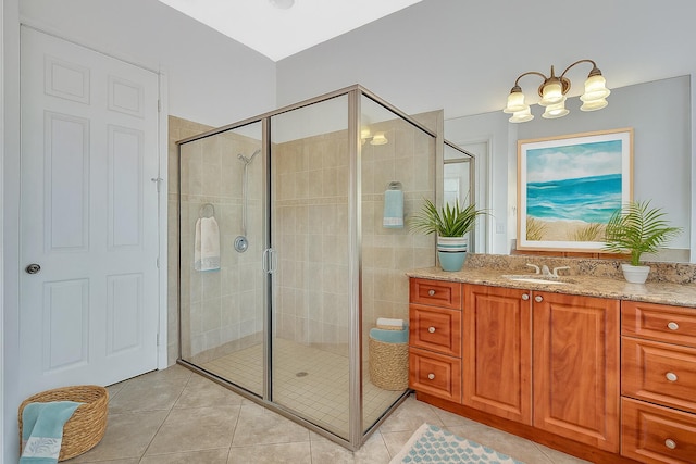 1897 SW Citation Ave, Port Saint Lucie, FL 34953 - bathroom with vanity, tile patterned floors, a stall shower, and a chandelier