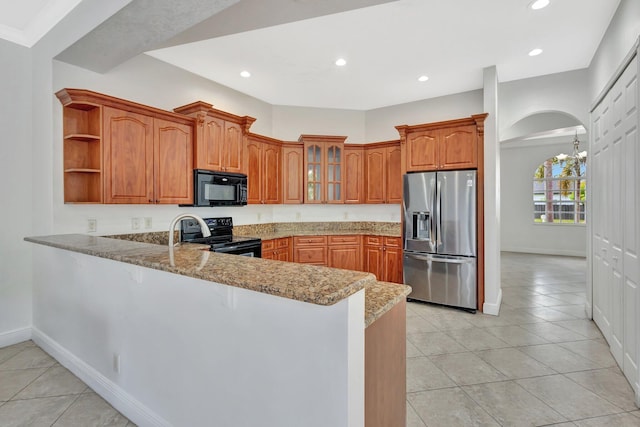 1897 SW Citation Ave, Port Saint Lucie, FL 34953 - kitchen featuring black appliances, a peninsula, open shelves, light tile patterned flooring, and recessed lighting