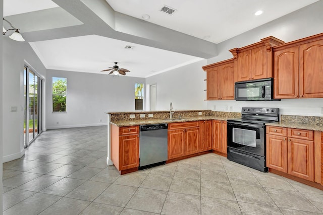 1897 SW Citation Ave, Port Saint Lucie, FL 34953 - kitchen featuring black appliances, a sink, a peninsula, light tile patterned floors, and stone counters