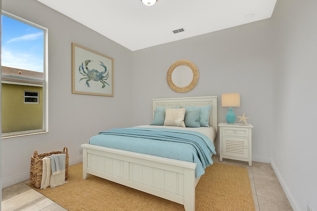 1897 SW Citation Ave, Port Saint Lucie, FL 34953 - tiled bedroom featuring baseboards