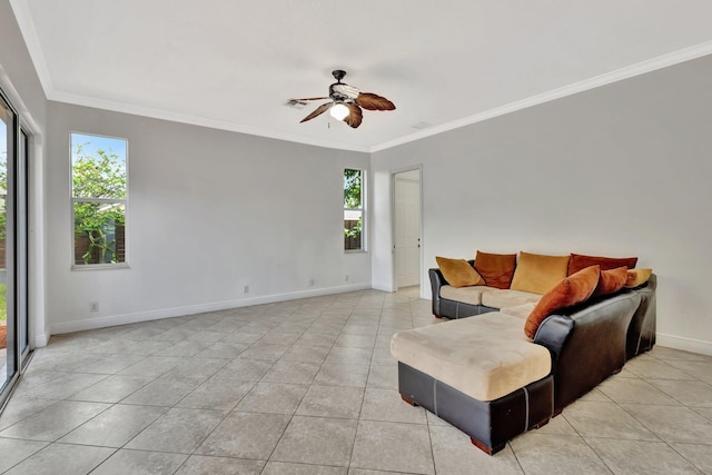 1897 SW Citation Ave, Port Saint Lucie, FL 34953 - living room featuring light tile patterned floors, a ceiling fan, crown molding, and baseboards