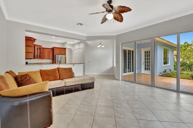 1897 SW Citation Ave, Port Saint Lucie, FL 34953 - living room with ceiling fan, light tile patterned flooring, baseboards, ornamental molding, and recessed lighting