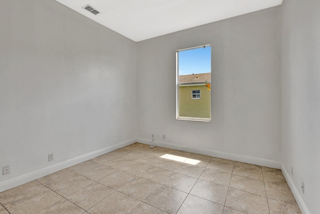 1897 SW Citation Ave, Port Saint Lucie, FL 34953 - spare room with light tile patterned floors and baseboards