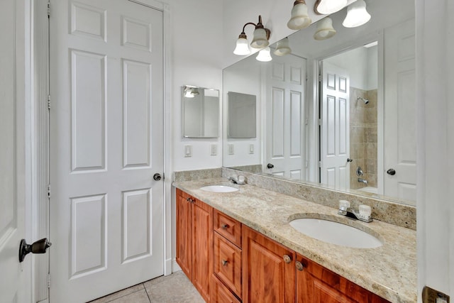 1897 SW Citation Ave, Port Saint Lucie, FL 34953 - full bathroom featuring double vanity and tile patterned floors