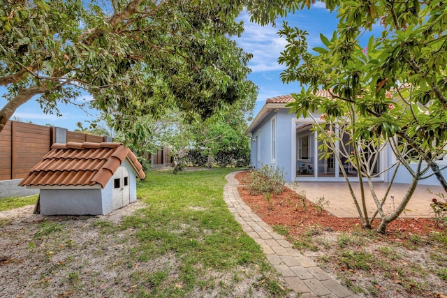 1897 SW Citation Ave, Port Saint Lucie, FL 34953 - view of yard with a patio area