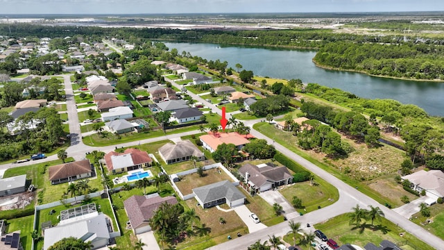 1897 SW Citation Ave, Port Saint Lucie, FL 34953 - aerial view of property's location with a large body of water and nearby suburban area