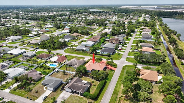 1897 SW Citation Ave, Port Saint Lucie, FL 34953 - aerial overview of property's location featuring nearby suburban area and a nearby body of water