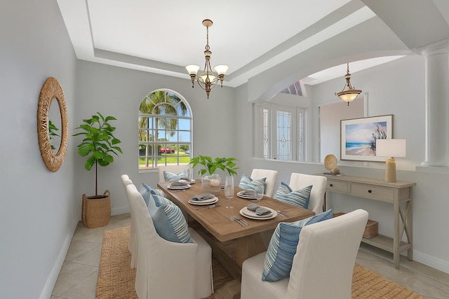 1897 SW Citation Ave, Port Saint Lucie, FL 34953 - dining area with a chandelier, light tile patterned flooring, ornate columns, and a raised ceiling
