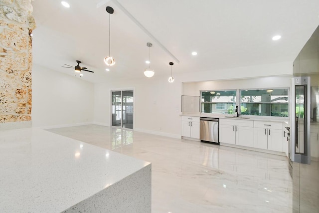 4873 SE Pilot Way, Stuart, FL 34997 - kitchen featuring stainless steel appliances, a sink, a ceiling fan, pendant lighting, and white cabinets
